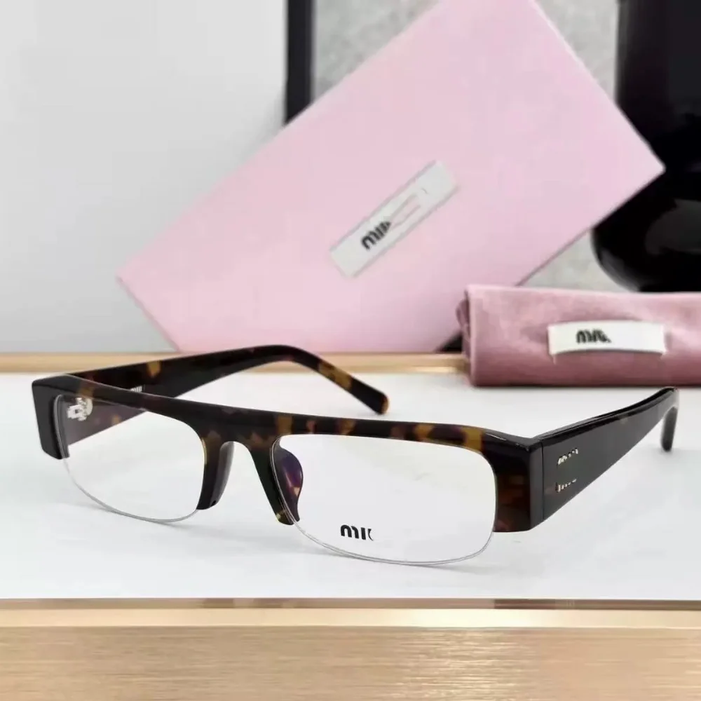 Miu Miu Tortoiseshell acetate rectangular optical glasses with metal accents