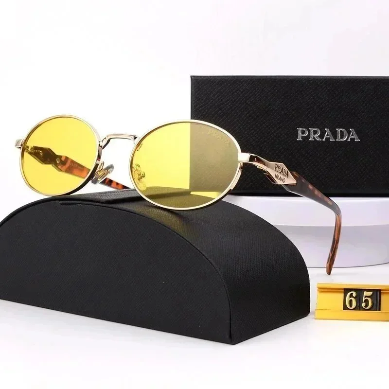 Prada Oval gold-tone frame yellow lens sunglasses