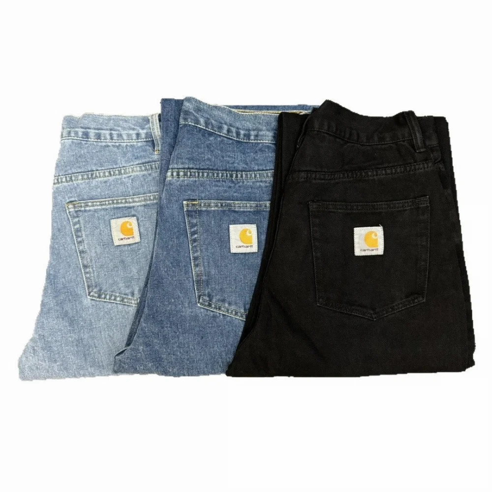 Carhartt Light medium and black denim straight-leg jeans with back pocket logo
