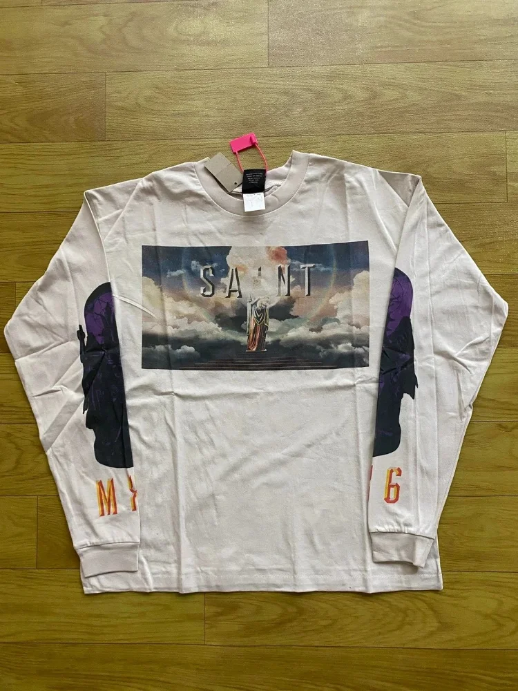 Off-white long sleeve t-shirt with cloud and saint graphic print, purple sleeve panels, orange lettering