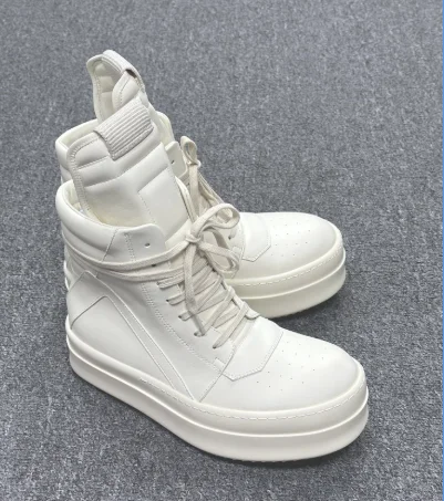 White leather high-top lace-up sneakers with perforated toe and chunky sole