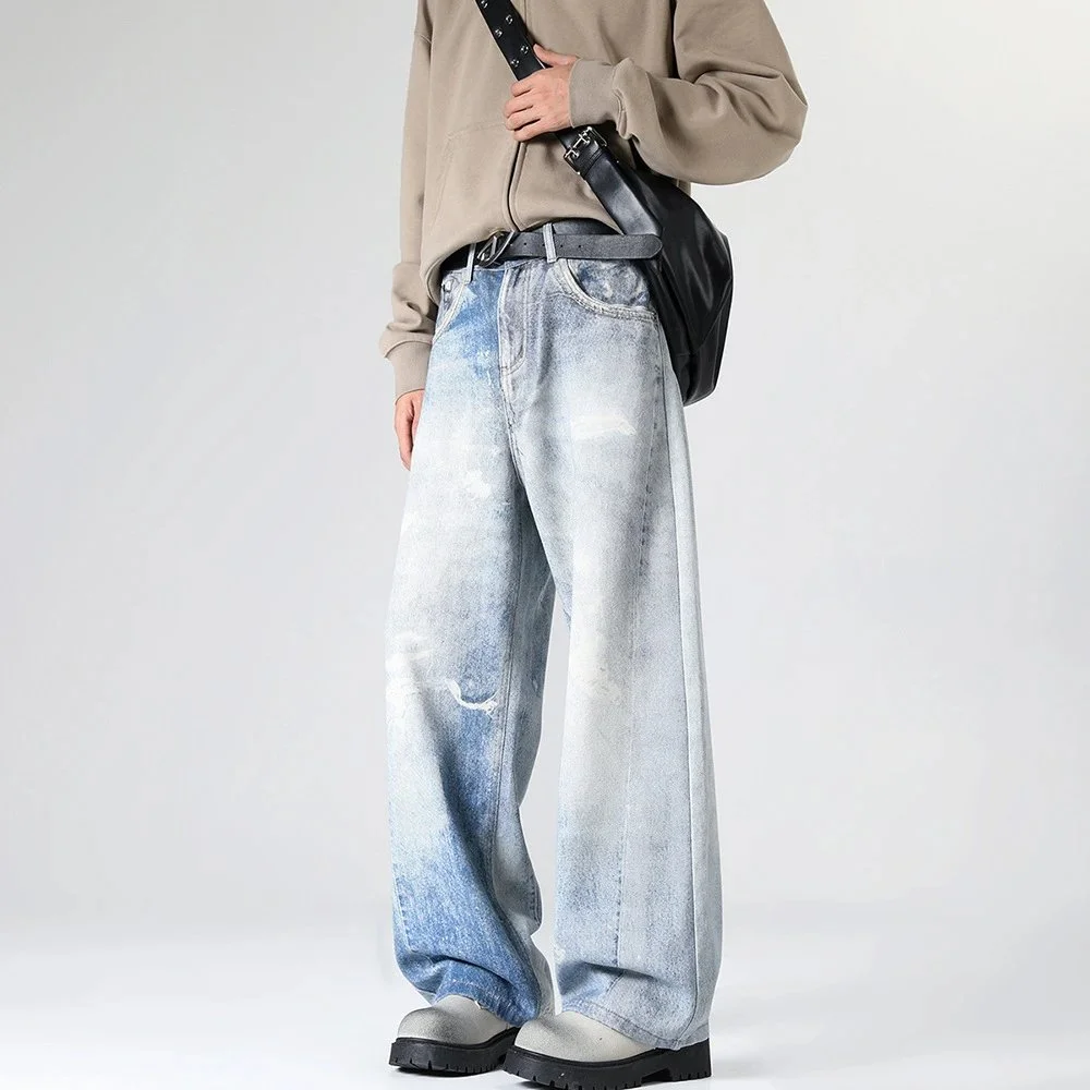 light blue tidal wash distressed loose fit denim jeans