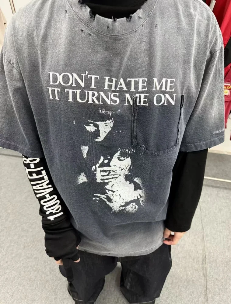 Dark washed distressed cotton tee with front photo print and gold back script