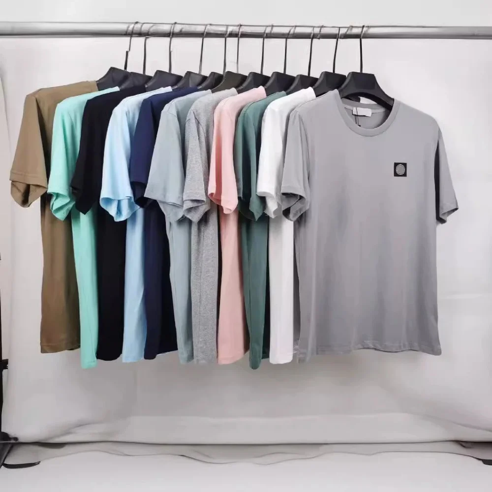 Pink and grey plain cotton short sleeve t-shirt with small black square logo patch