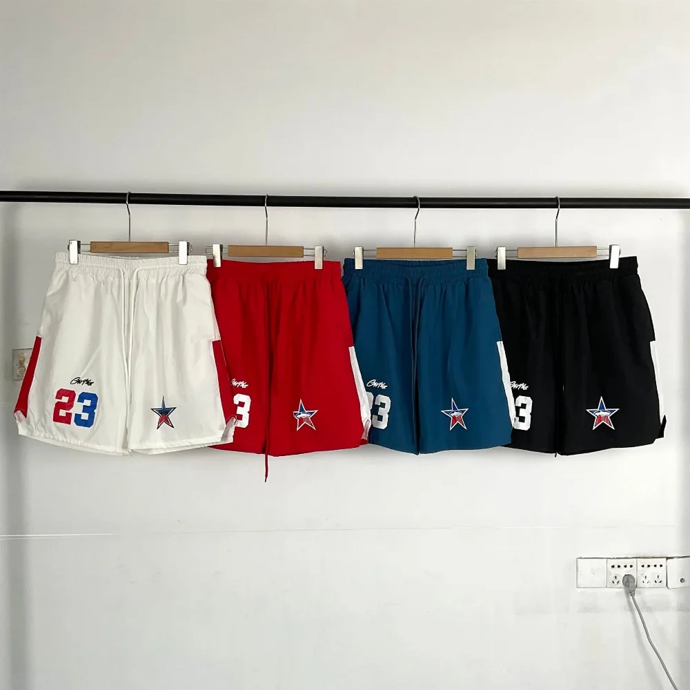 white nylon shorts red side panels blue red 23 number star patch