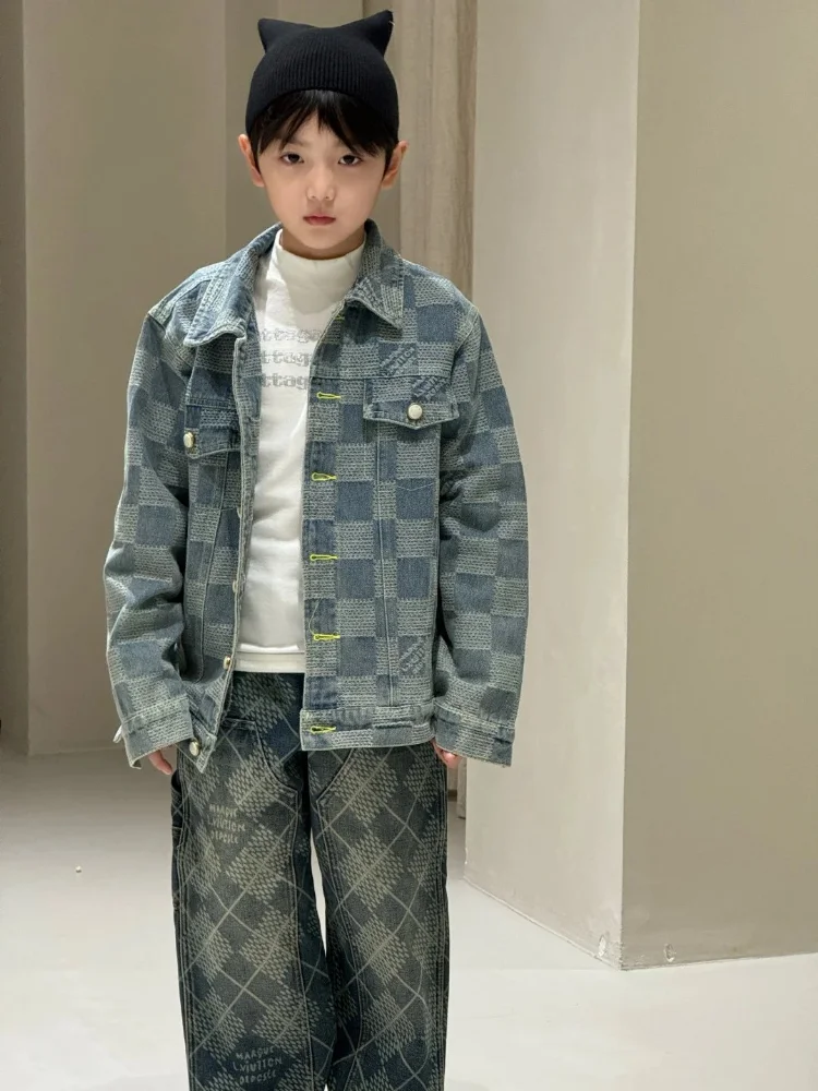 Blue denim jacket with woven checkerboard pattern and pearl buttons