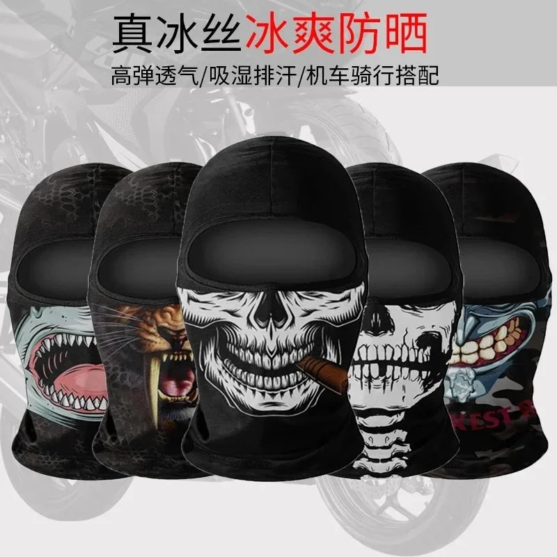 Black stretch fabric balaclava with full-face graphic print including skull, shark mouth, and venom-themed designs