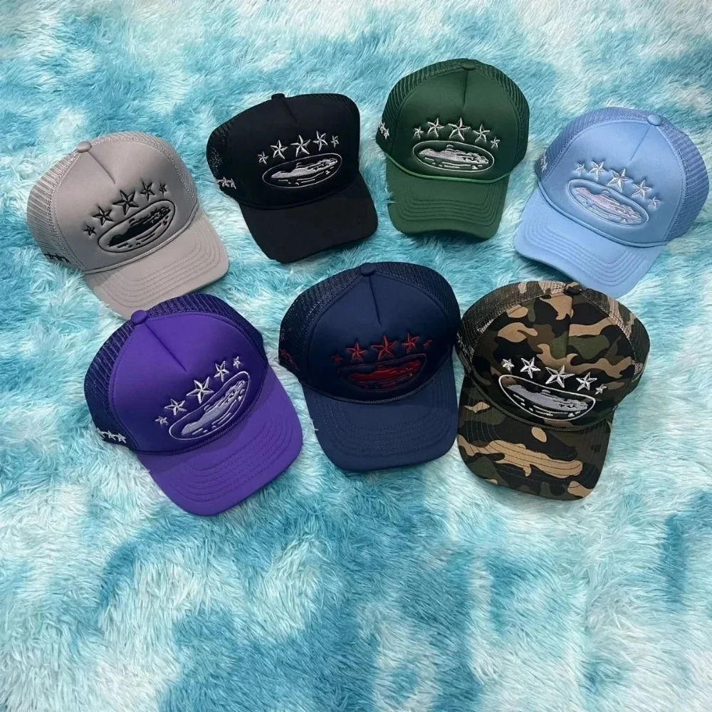 Camo or solid color trucker hat with embroidered spaceship and star patch