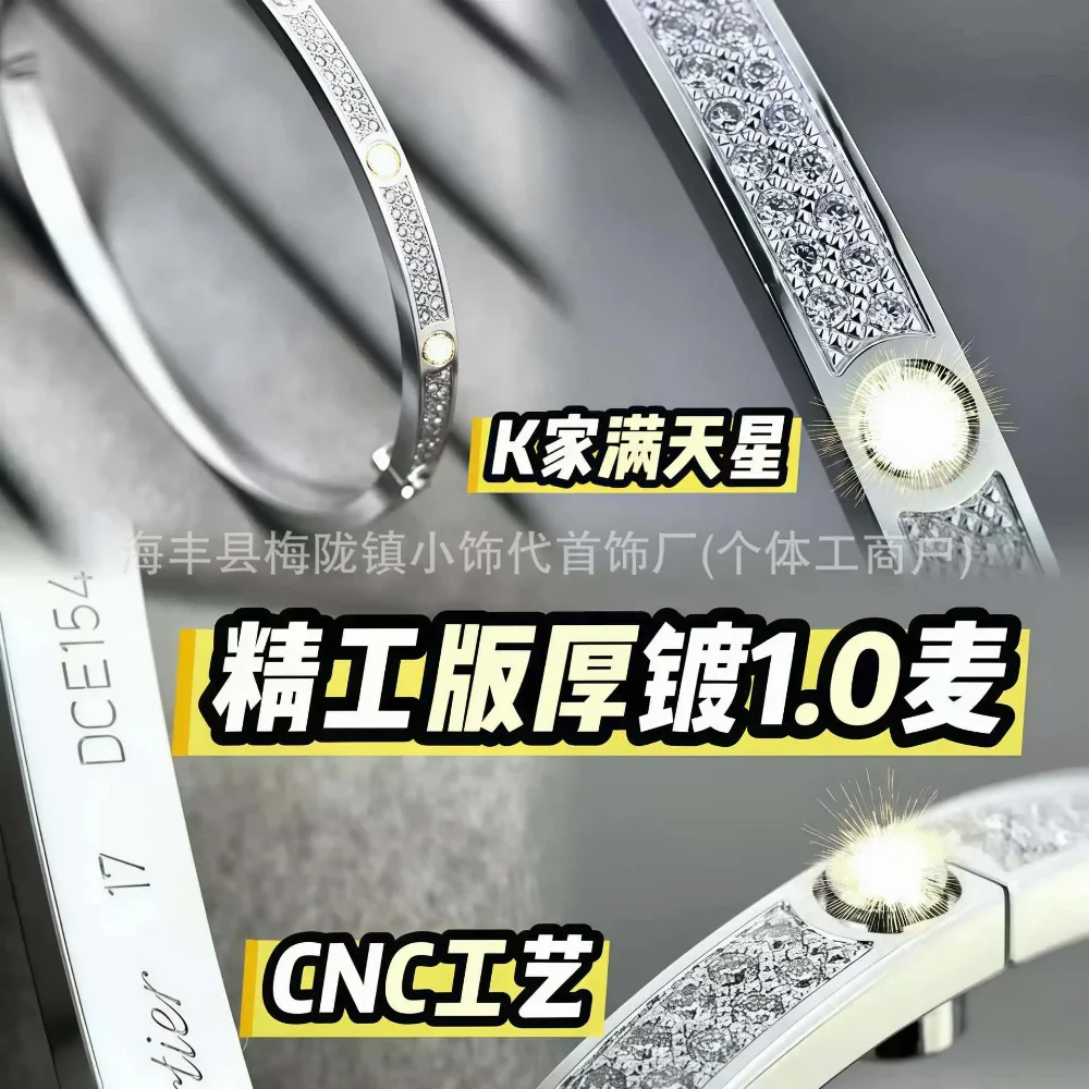 Polished metal wide bangle with four round clear stones