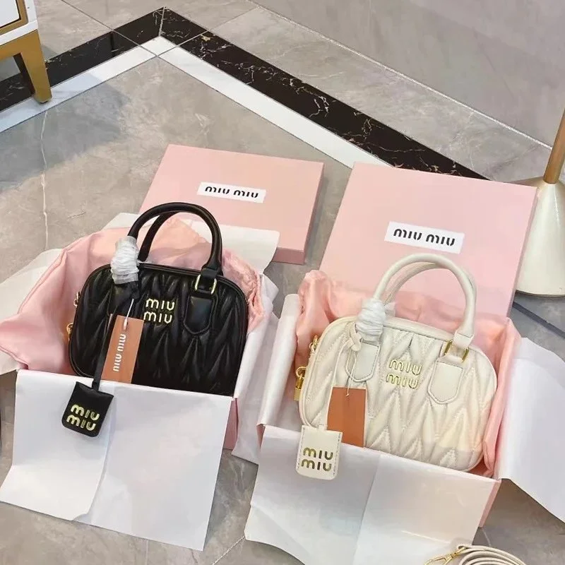 Miu Miu Quilted Mini Top-Handle Handbag