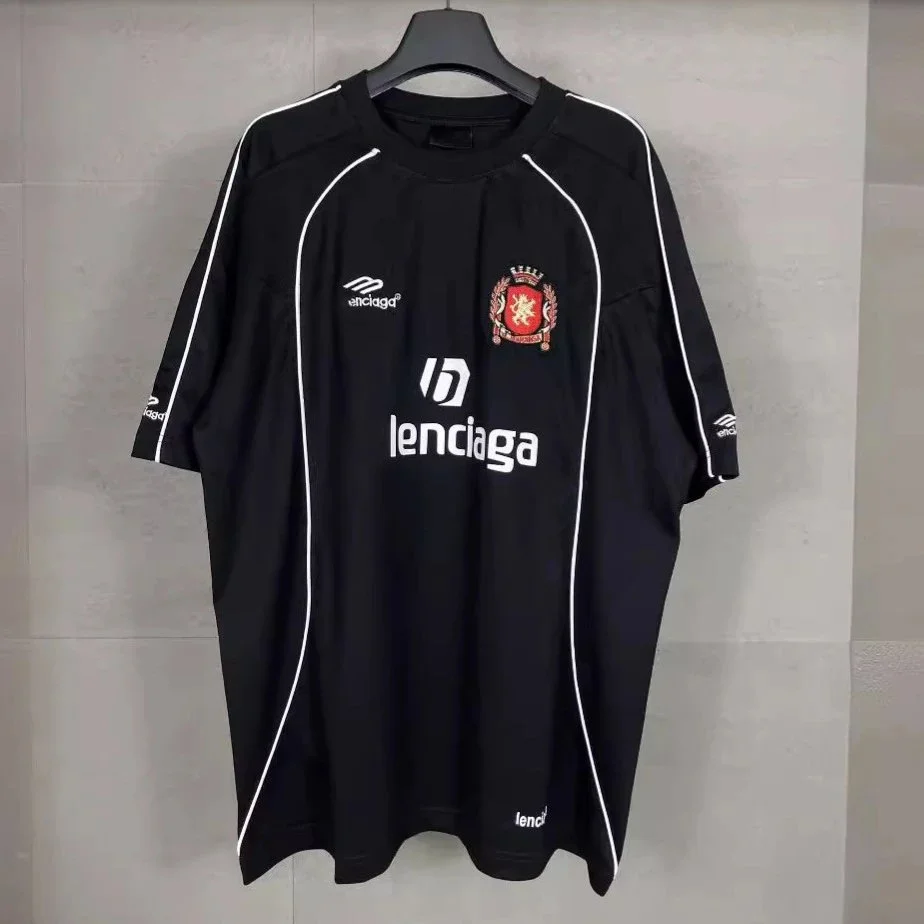 Lenciga Black short-sleeve jersey with white piping and crest embroidery