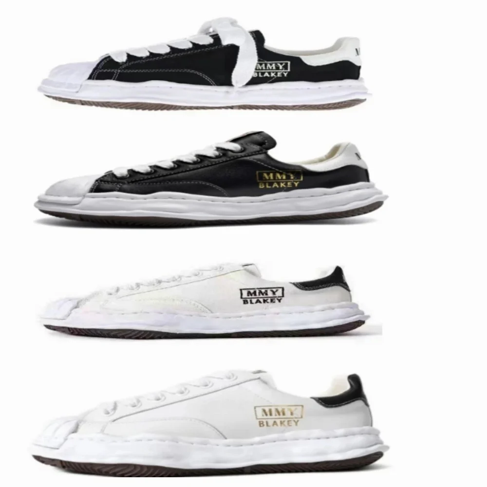 MMY Blakey Black and white low-top sneakers with layered sole and side