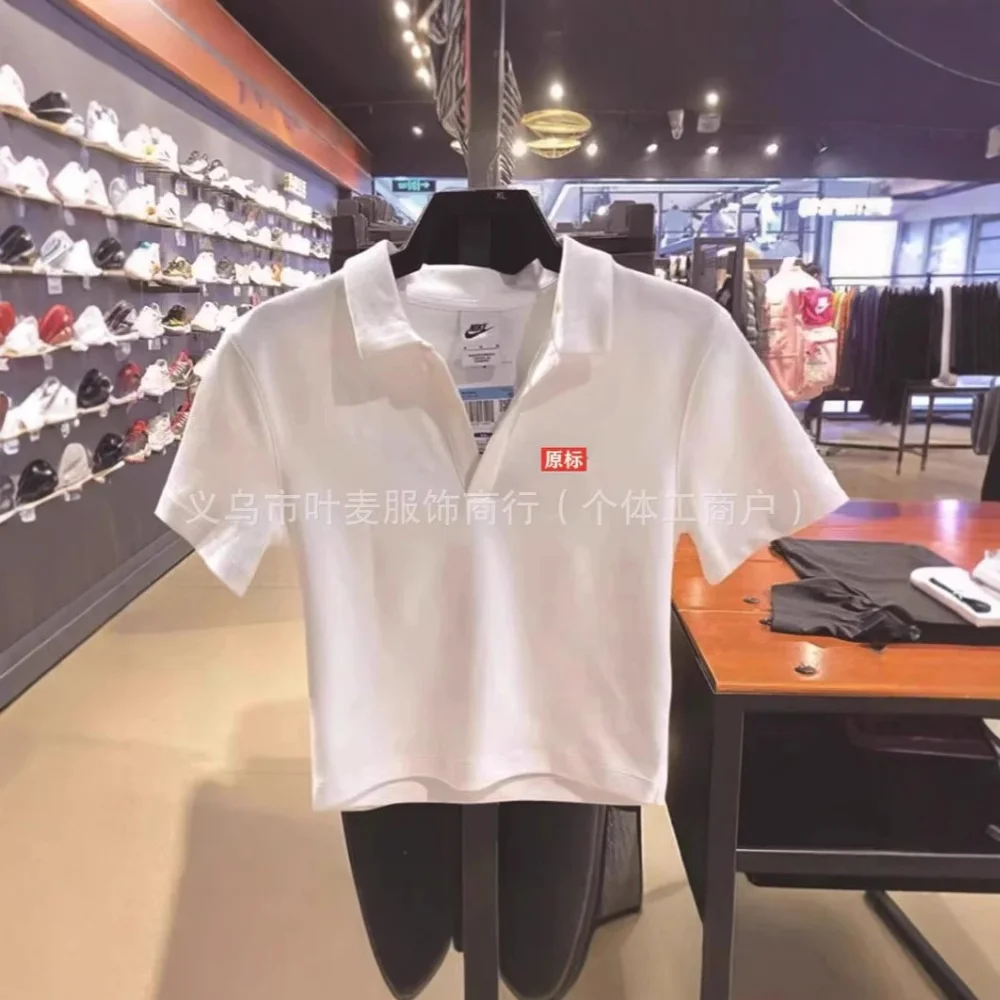 Nike White short-sleeve polo shirt with collar and clean design