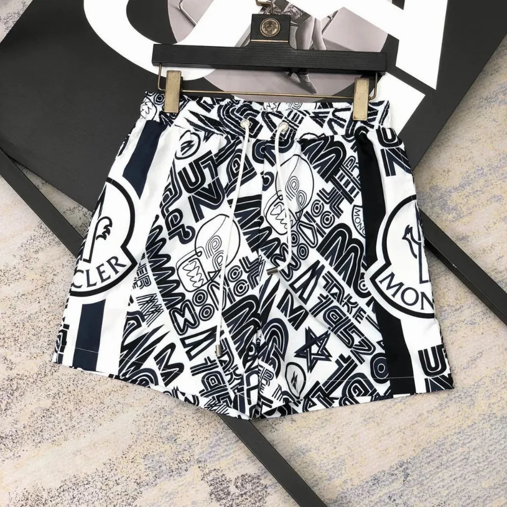 Moncler All-Over Logo Print Shorts