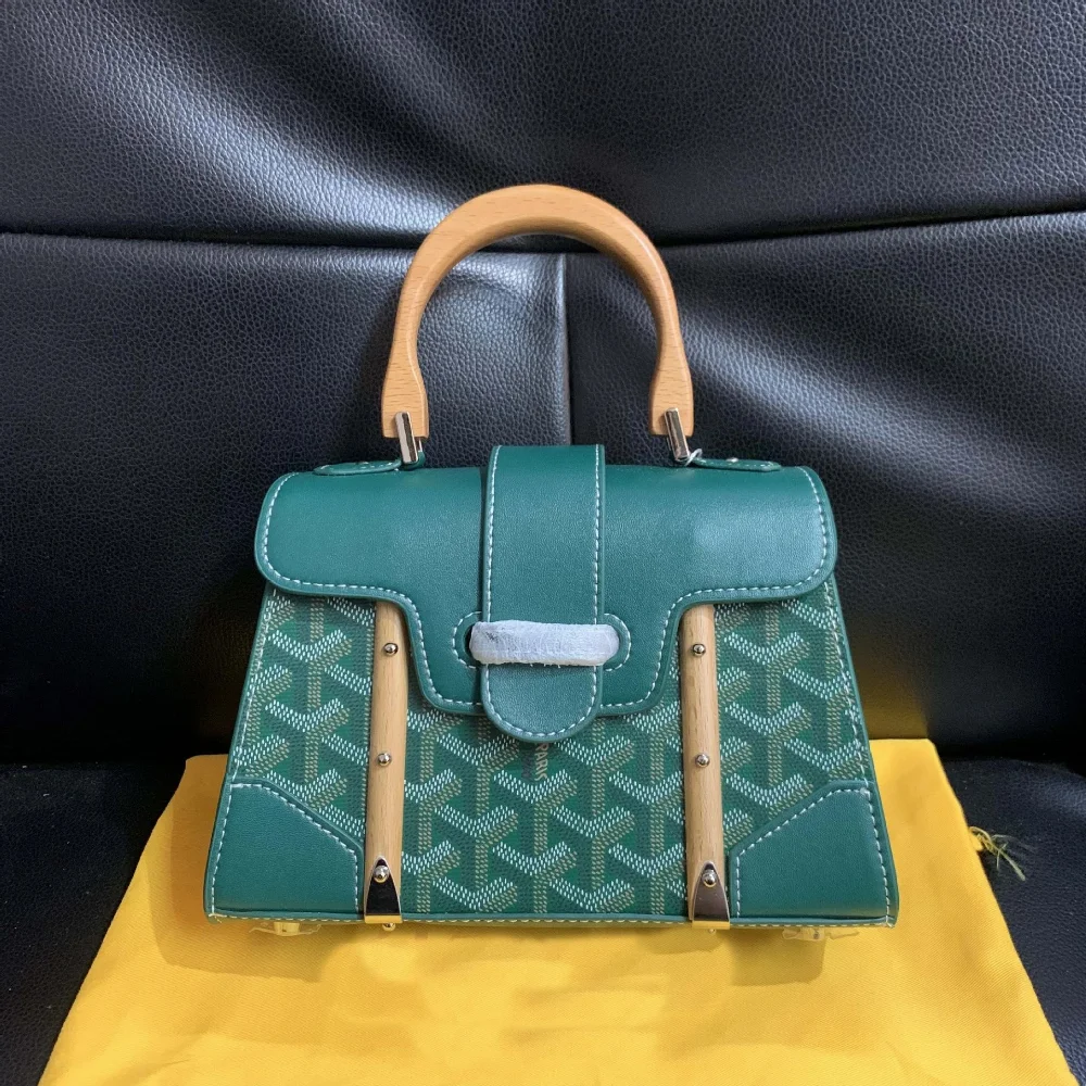 Goyard Teal leather handbag with Y-monogram canvas and wooden top handle