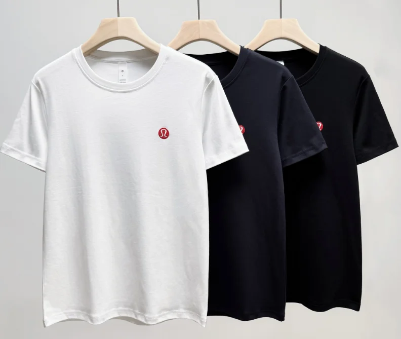 Lululemon White and black crewneck short-sleeve t-shirts with small red circular logo