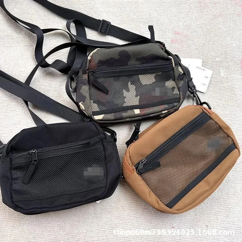 Black brown camouflage canvas crossbody bag with front mesh panel and zipper