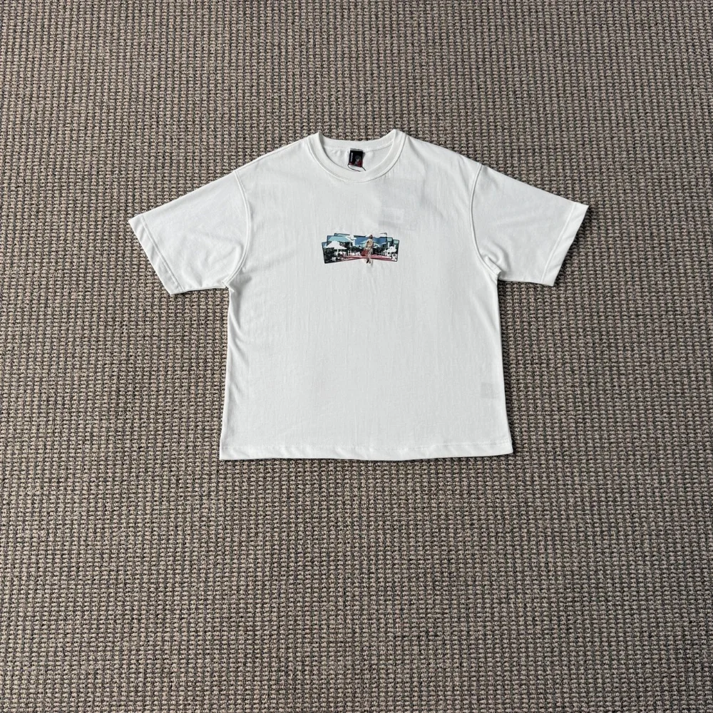 White short-sleeve crewneck T-shirt with rectangular collage print on chest
