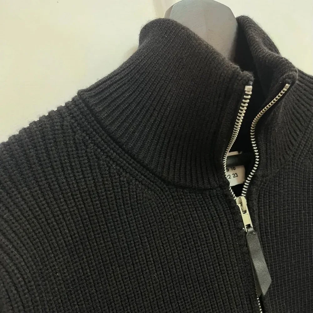 Grey ribbed knit full zip high neck sweater