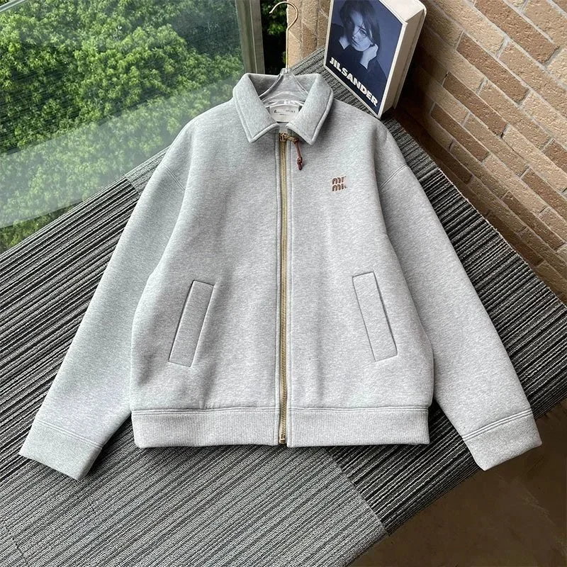 light grey heathered sweatshirt zip-up jacket collared two patch pockets embroidered chest logo