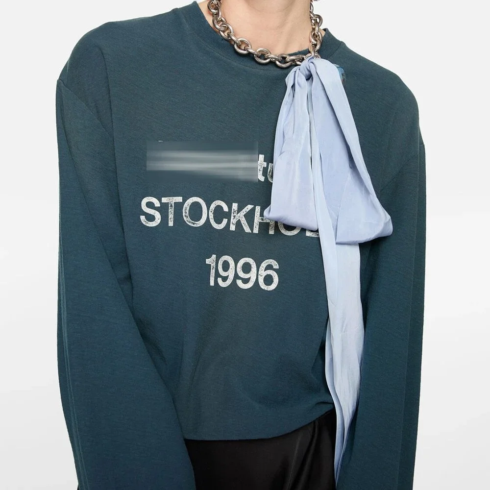 Long sleeve crewneck tee with distressed text print STOCKHOLM 1996