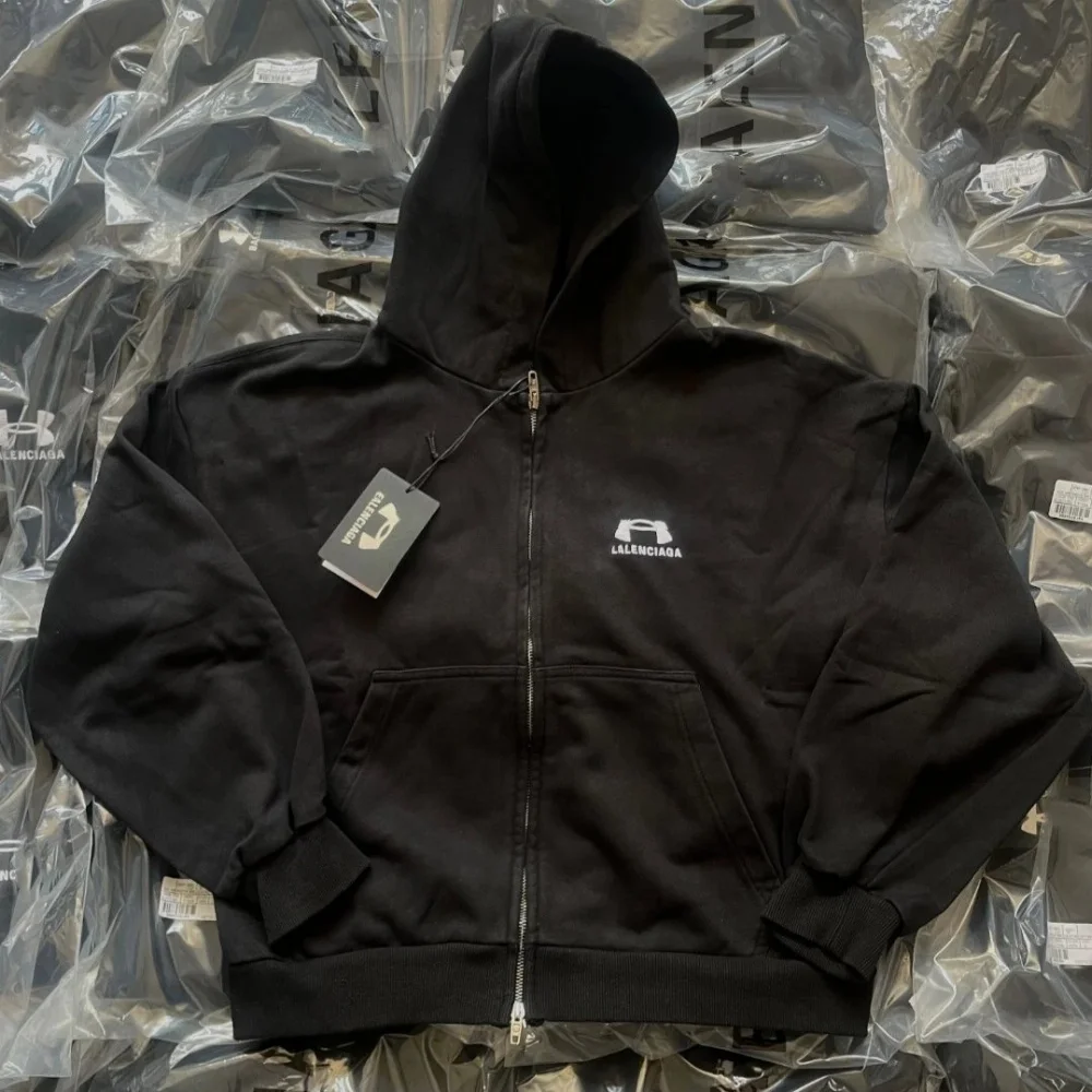 Balenciaga Black zip-up hoodie with embroidered logo front pocket ribbed cuffs