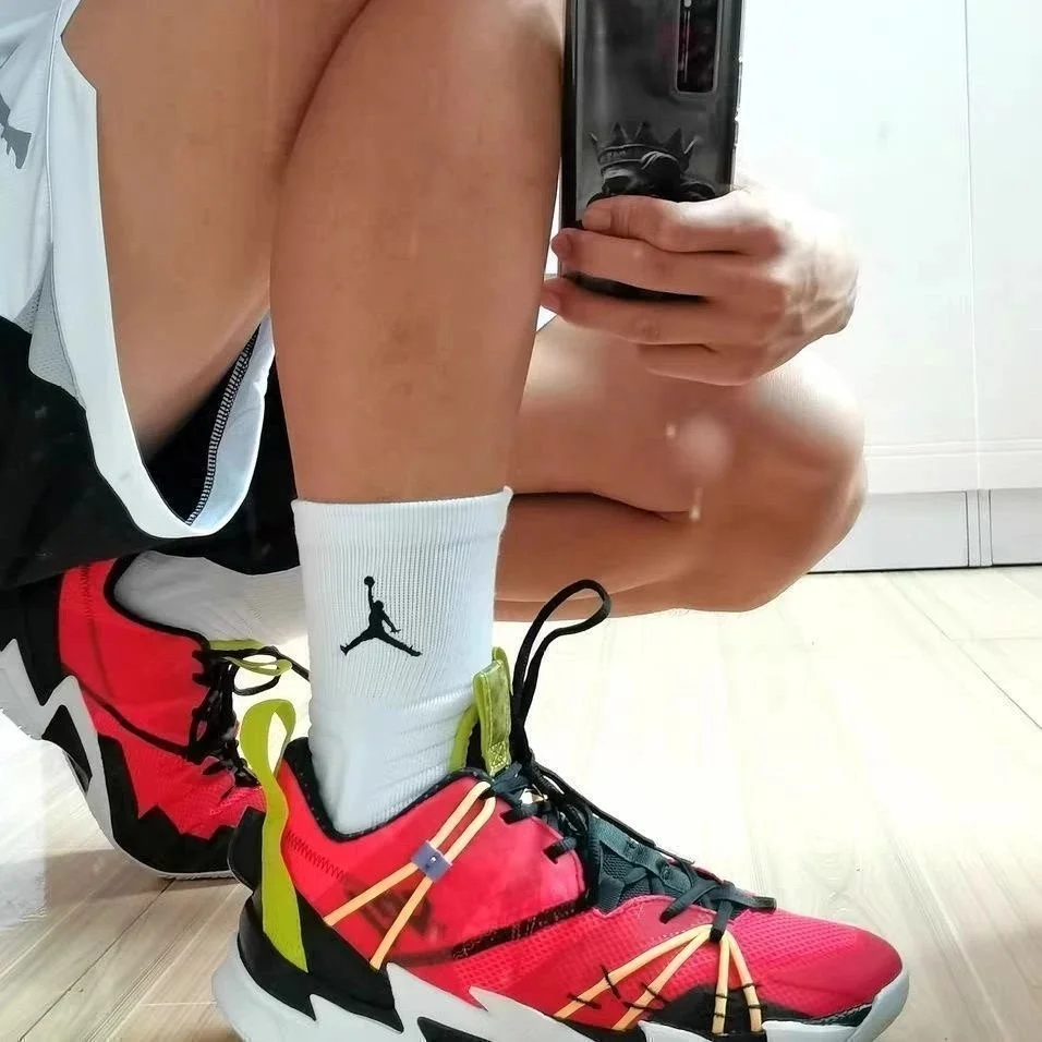 Jordan white ribbed crew socks with black Jumpman logo