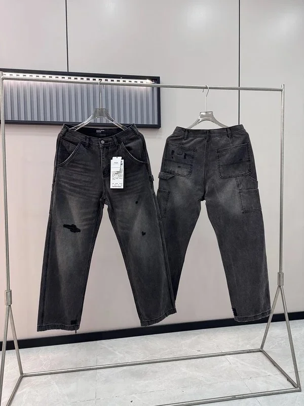 Black distressed denim jeans with cargo pockets and ripped details