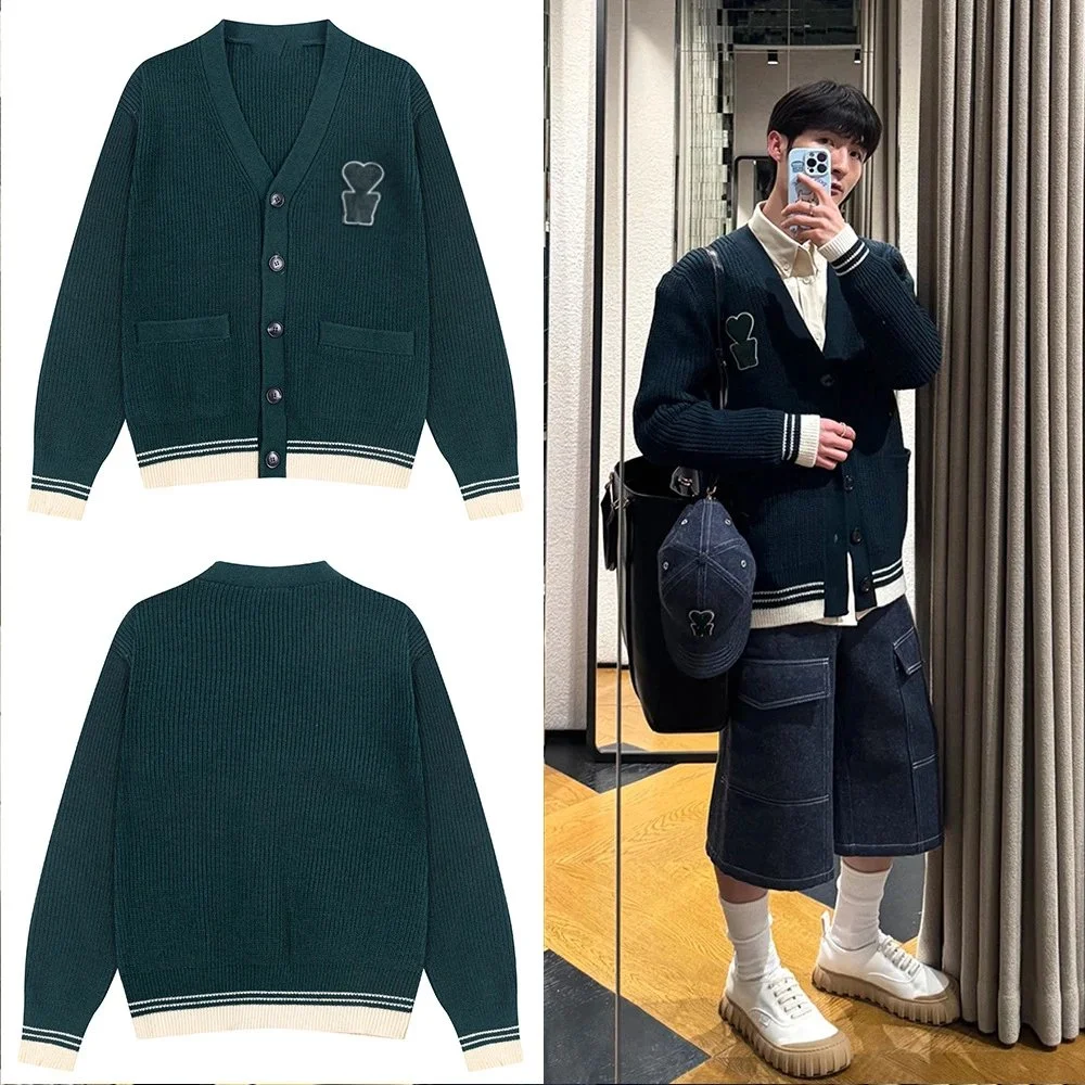 dark green ribbed knit V-neck cardigan with heart embroidery and contrast trim