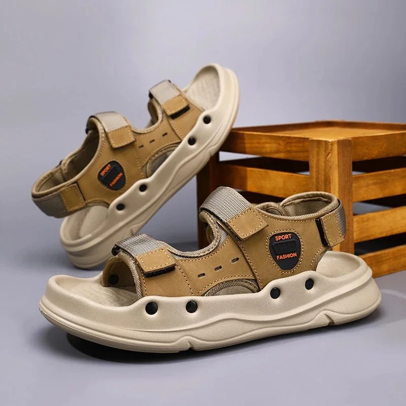 Black and brown two-strap sport sandals with vent holes and textured sole