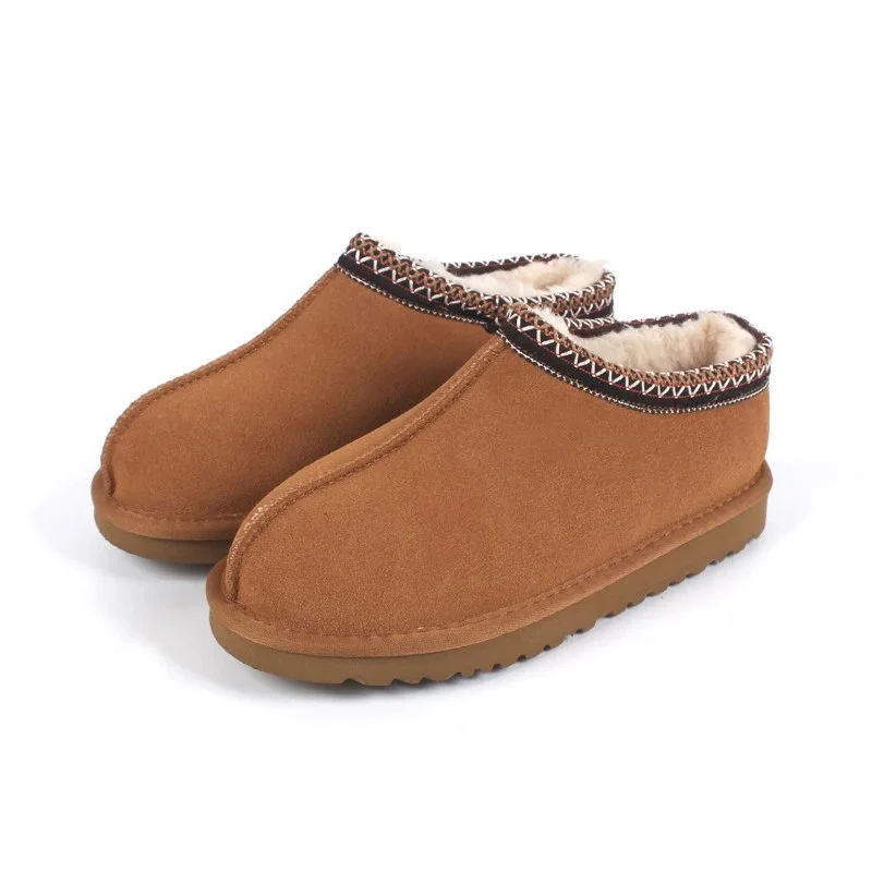 pink suede slipper with white zigzag trim and shearling lining