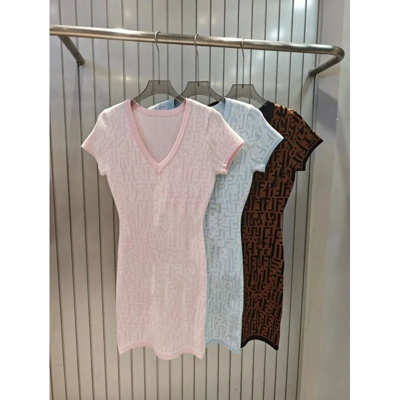 V-neck short-sleeve knit top with all-over monogram pattern in light blue pink and brown