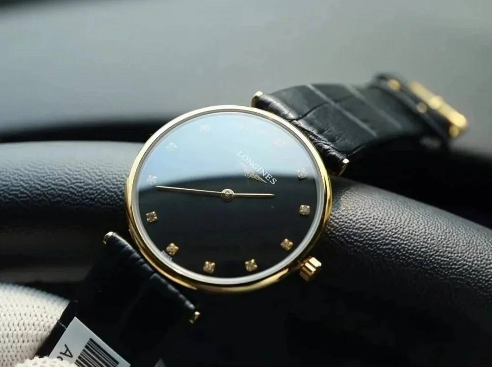 Longines Gold-tone case black dial diamond hour markers leather strap wristwatch
