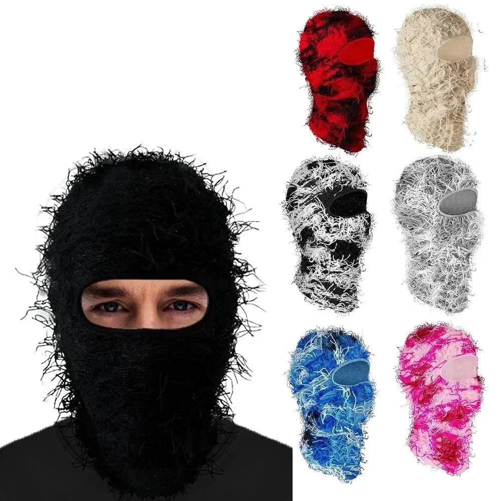 knit balaclava with loose fringed yarn overlay single eye opening