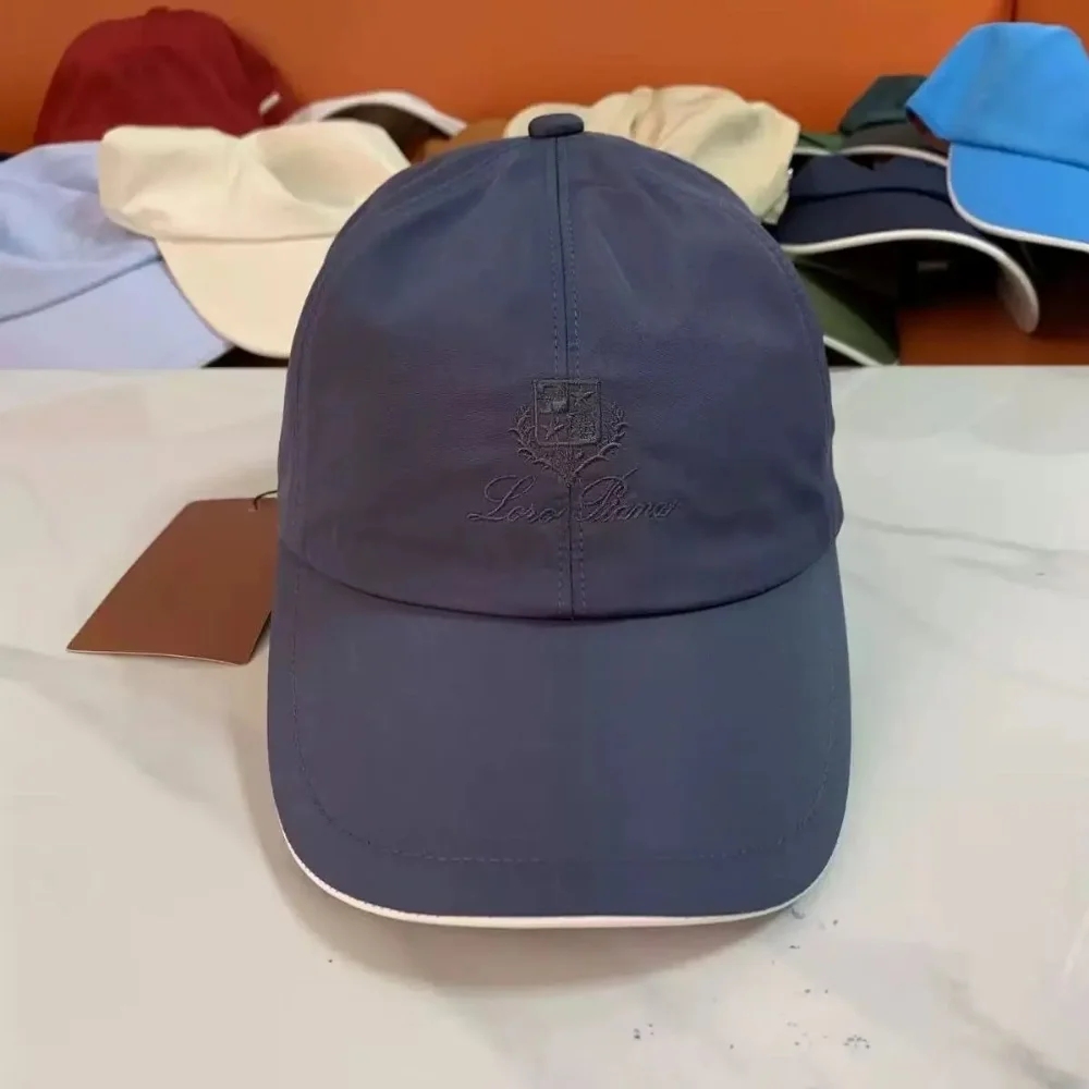 Loro Piana Navy blue embroidered crest cap with white brim trim
