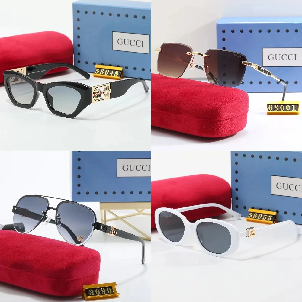 Gucci Black acetate cat-eye sunglasses with gold G-logo temple detail