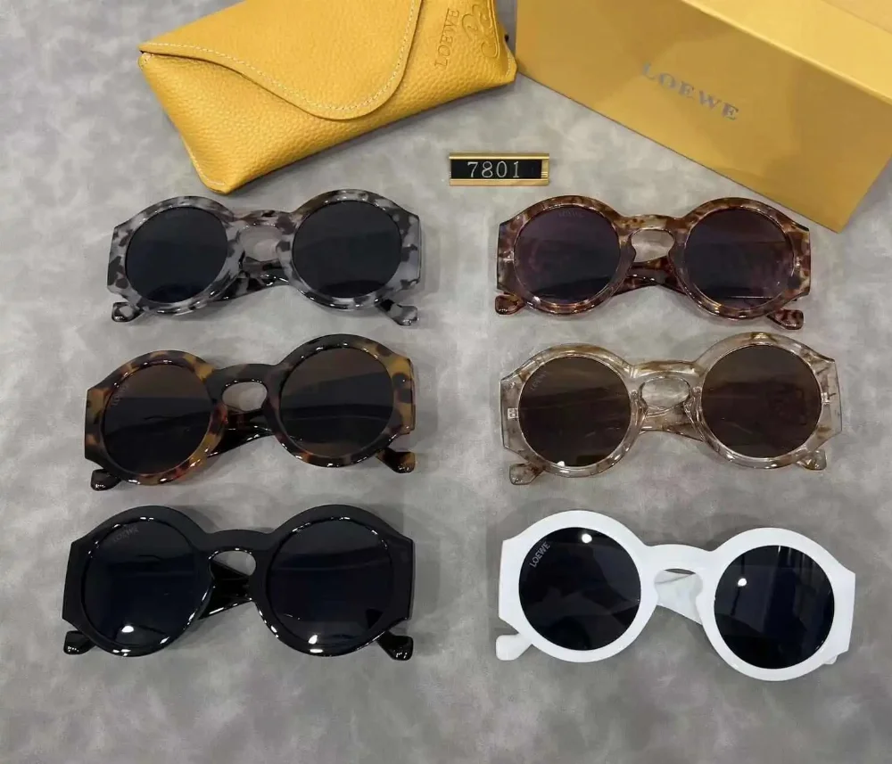 Loewe Round frame acetate sunglasses with geometric cutouts and dark lenses